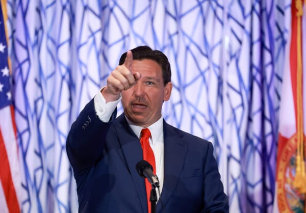 Florida Gov. Ron DeSantis speaks at a news conference in Miami Beach last week. (Joe Raedle / Getty Images)
