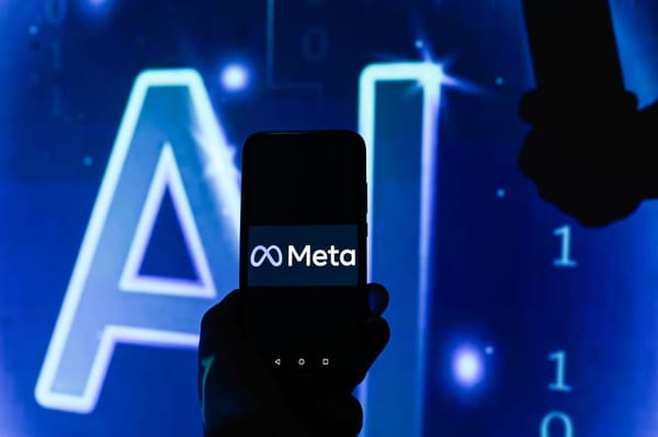 (Photo illustration of a phone showing the Meta logo against a backdrop reading "AI." Omar Marques / Getty Images)