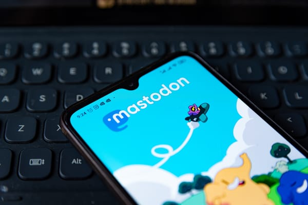 Mastodon displayed on a smartphone screen against a black keyboar(Davide Bonaldo / Getty Images)