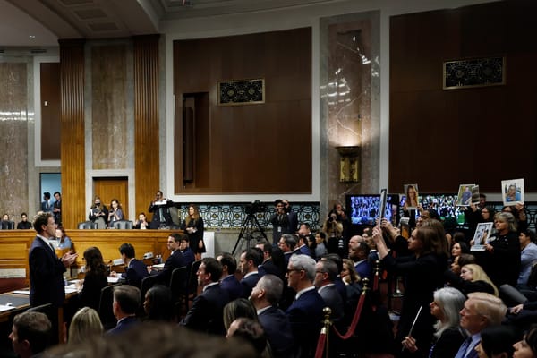 Mark Zuckerberg addresses families during a Senate hearing Wednesday. (Anna Moneymaker / Getty Images)
